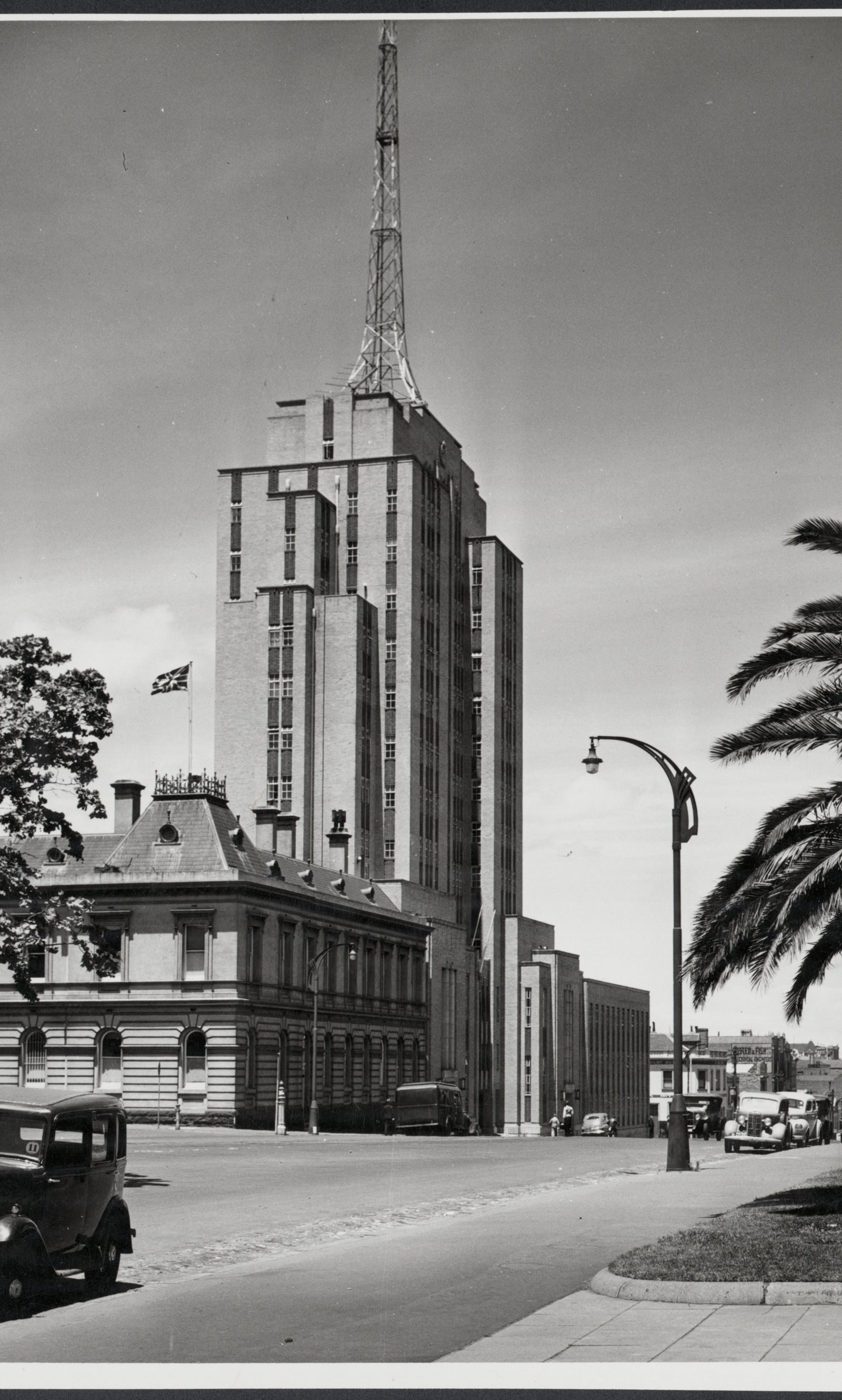 The old police offices on the corner with the new brick headquarters tower behind, about 1948 to 1950.